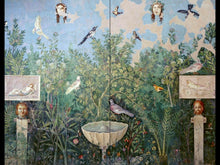 Load image into Gallery viewer, The inside of the book. Both pages feature a double spread of a large painting of a leafy nature scene. There are a variety of birds and a fountain in the centre. Either side of the fountain are pillars with decapitated human heads on them, and two more heads are suspended from the top of the painting.