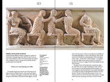Load image into Gallery viewer, The inside of the book. Both pages feature a double spread of a carving at the top. The carving is damaged and shows several figures sitting in a row having a conversation. Under the image on both pages is paragraphs of black text.