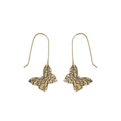 A pair of dangling brass earrings in the shape of butterflies.